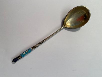 null Silver spoon, the handle twisted, the spoon vermeiled with enamelled and filigree...