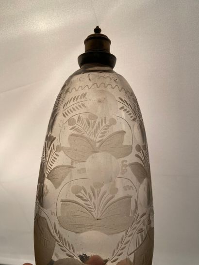 null GERMANY 

Bottle to be posed out of translucent and colorless blown glass, with...