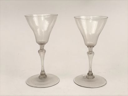 null TWO GLASSES in colorless and translucent blown glass, the leg with the bubble,...