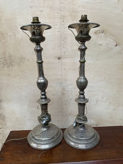 null PAIR OF FLAMPS in silver plated copper with a baluster shaft decorated with...