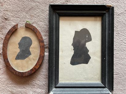 null TWO SILHOUETTES showing two profiles of men, one wearing a hat. 

19th century

Dim....