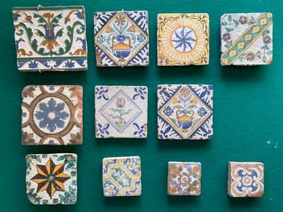 null SET OF ELEVEN earthenware TILES and a dish with polychrome enamelled decoration...