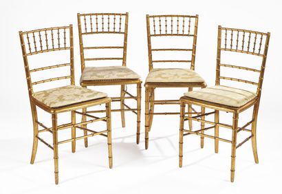 null FOUR baguette back chairs in gilded wood imitating bamboo. 

83 x 40 x 35 c...