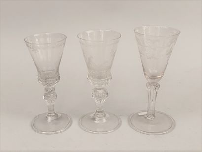 null SET of three glasses with leg in colorless glass including:

- One engraved...