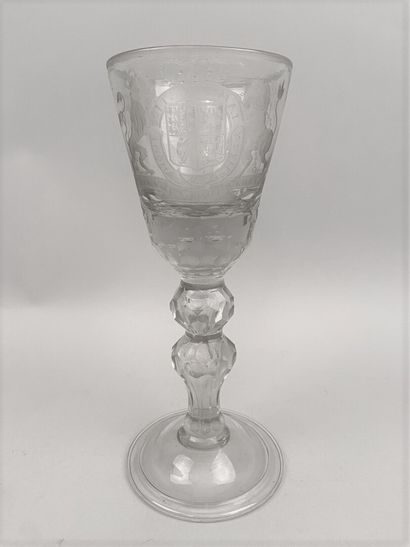 null GERMANY

Large blown glass stemmed glass, the chalice engraved with the arms...