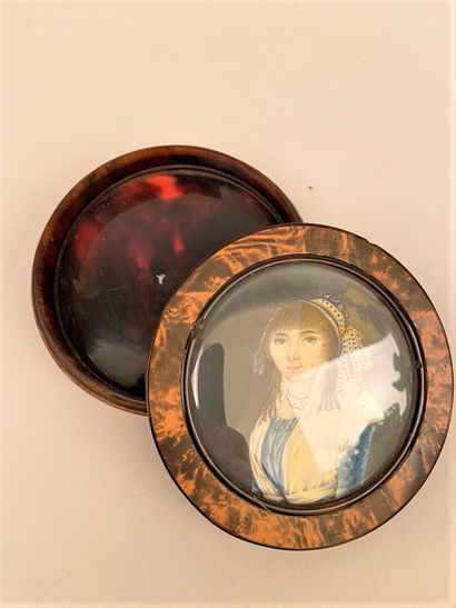 null Round box in burr wood and tortoiseshell decorated with a miniature portrait...