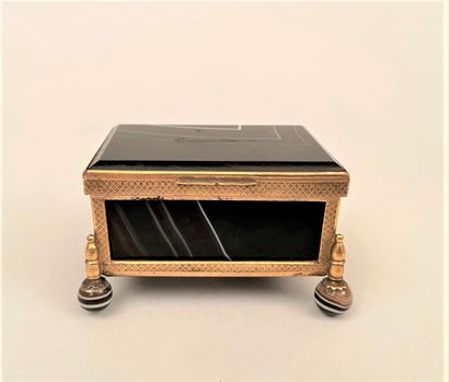 null Rectangular case, mounted with gilt brass cage and zoned agate panels, standing...