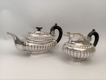 . PART OF TEA SERVICE in silver 950 thousandths including a teapot and a creamer,...