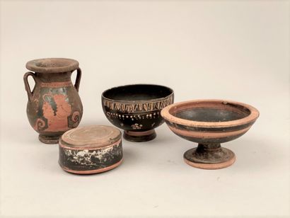 null SET in terracotta with black glaze including :

- A crater vase decorated with...