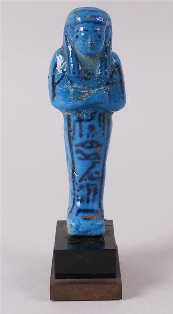 null A lapis lazuli blue glazed earthenware OUSHEBTI from the royal hideout at Deir-el-Bahari....