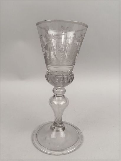 null GERMANY

Large blown translucent glass, the chalice with engraved decoration...