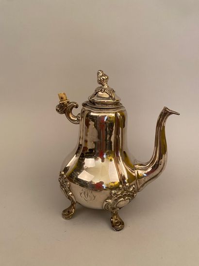 null Silver teapot 950 thousandth of baluster form posing on four feet with attachments...