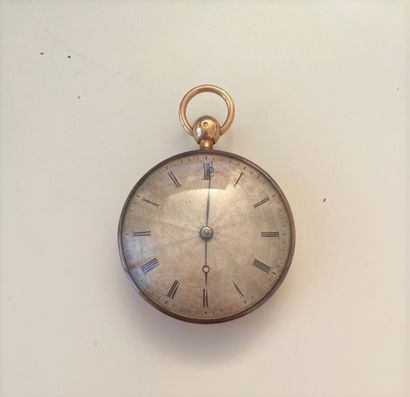 null A yellow gold watch with a guilloche dial and Roman numerals. The guilloche...