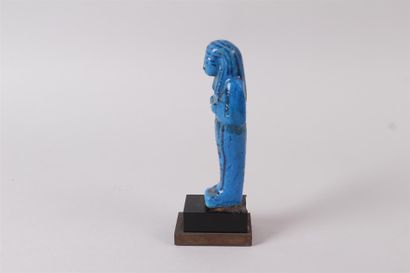 null A lapis lazuli blue glazed earthenware OUSHEBTI from the royal hideout at Deir-el-Bahari....