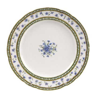 null SÈVRES

Marie-Antoinette's pearls and barbels service plate in soft porcelain...