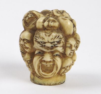 null JAPAN - MEIJI period (1868 - 1912)

An ivory cane knob with masks in various...