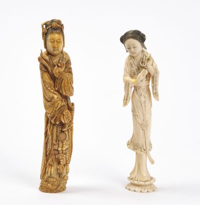 null CHINA and VIETNAM - About 1900

Two statuettes of young women in ivory, one...