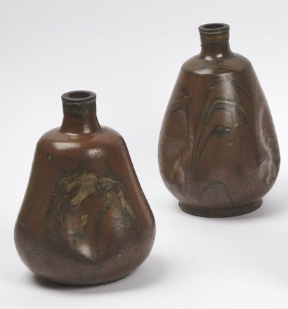 null JAPAN - EDO period (1603 - 1868), 19th century

Two dented brown and beige marbled...