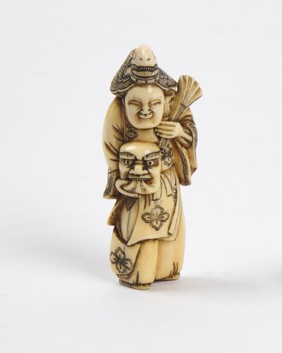 null JAPAN - EDO period (1603 - 1868)

Ivory netsuke, bugaku dancer standing, wearing...