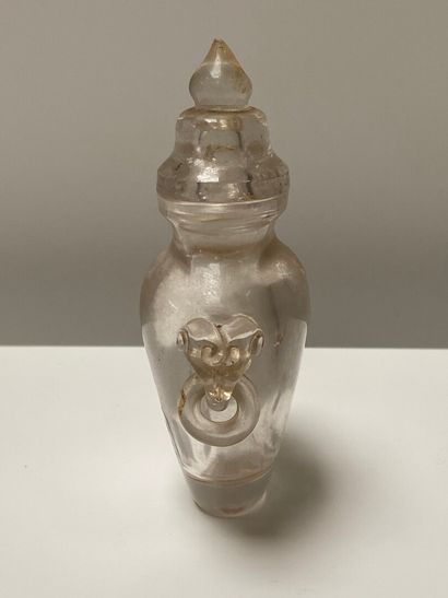 null CHINA - 19th century

A rock crystal miniature covered vase, the handles showing...