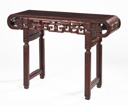 null CHINA - 19th century

Natural wood console with openwork decoration of archaistic...