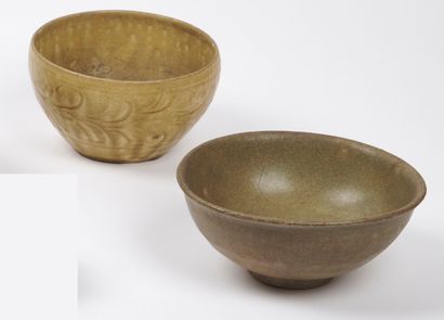 null CHINA and VIETNAM, TANHOA - 13th/14th century

An olive green and celadon glazed...
