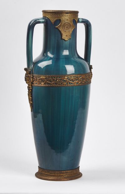 null FRENCH WORK

Ceramic vase with conical body and two lateral handles in application...