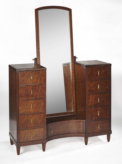 null FRENCH WORK 1930 

A burr mahogany dressing table with a large central pivoting...