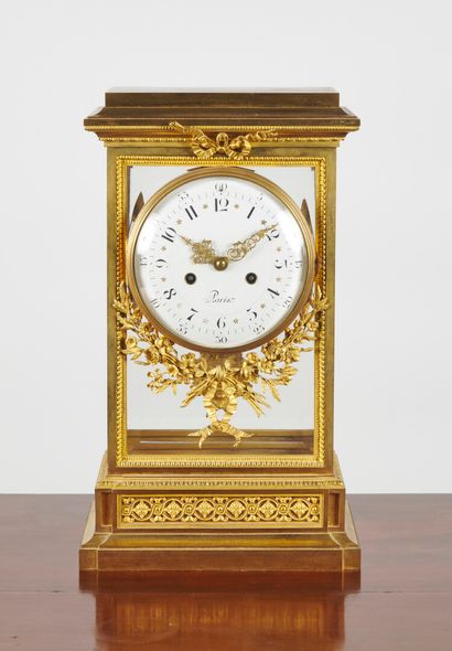 null Large ormolu cage clock decorated with friezes of darts and oves, hearts and...