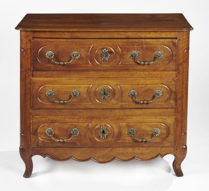 null A cherry wood and moulded oak chest of drawers, opening with three drawers,...