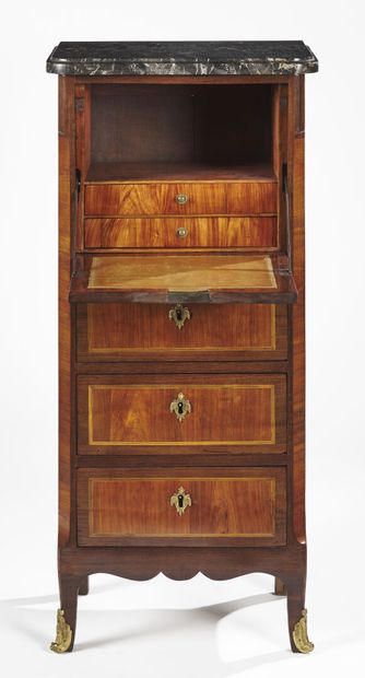 null Satinwood and amaranth desk with a flap simulating a chiffonier, opening with...