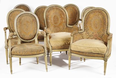 null Suite of six armchairs, two bergères and a sofa in moulded and painted beech,...