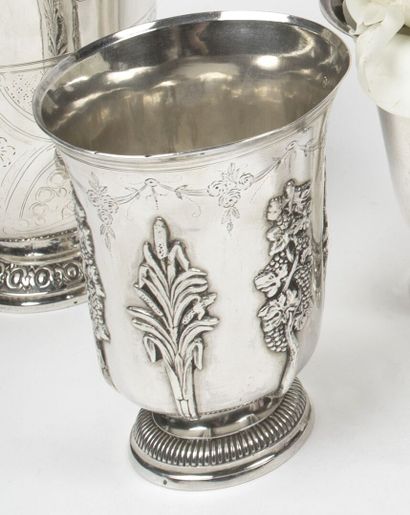 null A silver tulip TIMBALE decorated with alternating reeds and vines, surmounted...