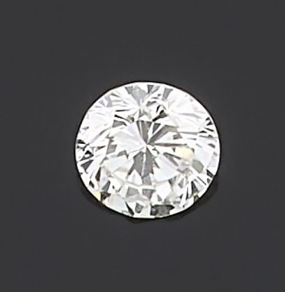 null DIAMOND treated on paper of round shape and brilliant cut.

Accompanied by a...