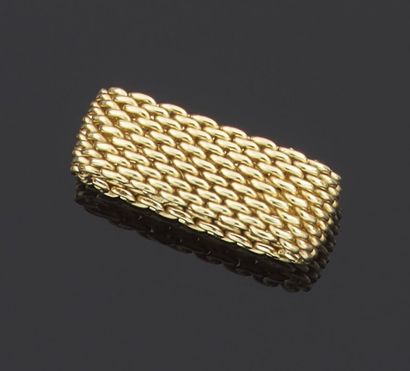 null TIFFANY & Co

Ring ribbon articulated in yellow gold 750 thousandths, the interlaced...