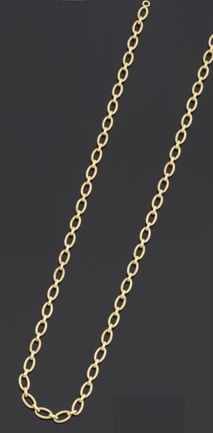 null NECKLACE articulated in yellow gold 750 thousandths, the engraved oval links....