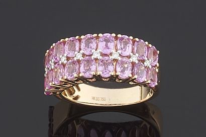 null RING in pink gold 750 thousandths decorated in the center of two lines of pink...