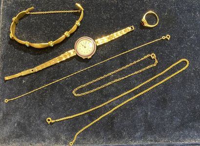 null LOT in metal including : a lady's watch, mechanical movement - an engraved bracelet...