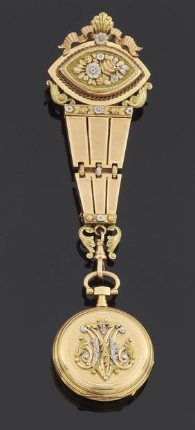 null CHATELAINE in gold 750 thousandths of several tone engraved with decoration...