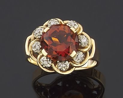 null RING in yellow gold 750 thousandths decorated in the center of a brown quartz...