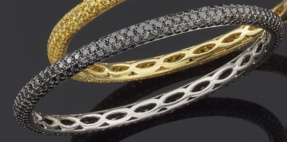 null BRACELET rigid white gold 750 thousandths, entirely paved with round diamonds...