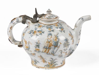 null MOUSTIERS

Earthenware covered globular teapot of baluster form with decoration...