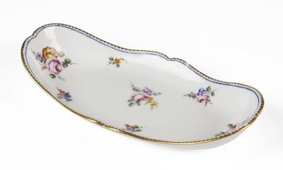 null SÈVRES

A soft porcelain breakfast tray with polychrome decoration of bouquets...