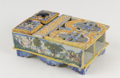 null ITALY

Rectangular earthenware writing case with an inkwell and an hourglass,...