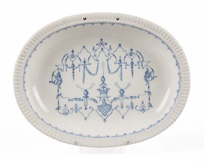 null SOUTHWEST

An earthenware oval basin with a blue camaïeu decoration in the style...