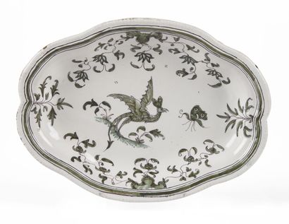 null MOUSTIERS

Small oval earthenware tray decorated with a fantastic bird on a...