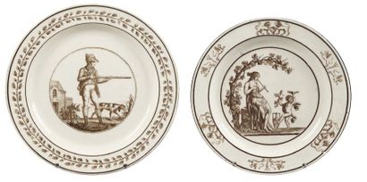 null SEVRES 

Two plates in fine earthenware decorated in bistre cameo with a hunter...