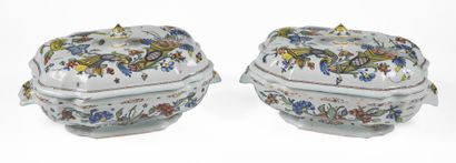 null ROUEN

Two covered oval earthenware terrines with contoured edges with polychrome...