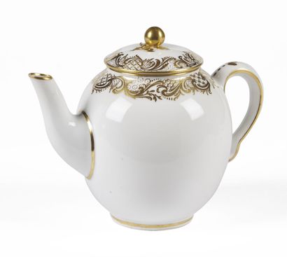 null SÈVRES

Calabrian teapot covered in hard porcelain with gold decoration of rocaille...