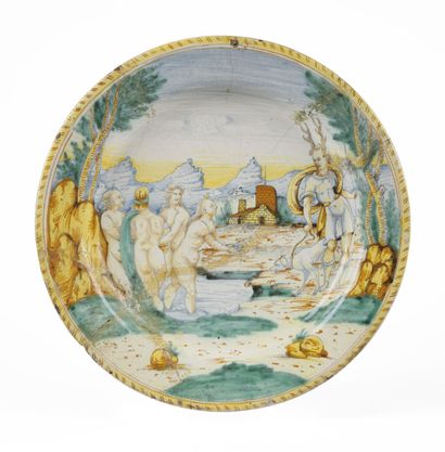 null DERUTA

Round earthenware dish with polychrome decoration of Diana and Actaeon....